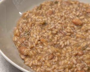 SOZZAGO (NO), ITALY - JULY 15A photo of the "paniscia". It is the typical risotto of the Novara area. It is a dish made with beans, salami and lard. It is a risotto that is blended with red wine, unlike almost all others that are blended with white wine.Photo by Davide Bertuccio for The Washington Post